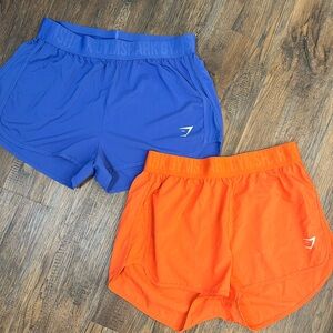 Gymshark loose fit training shorts, blue, orange size large